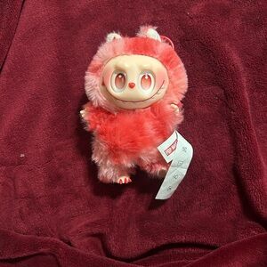 Adorable Pink Furry Creature Toy
